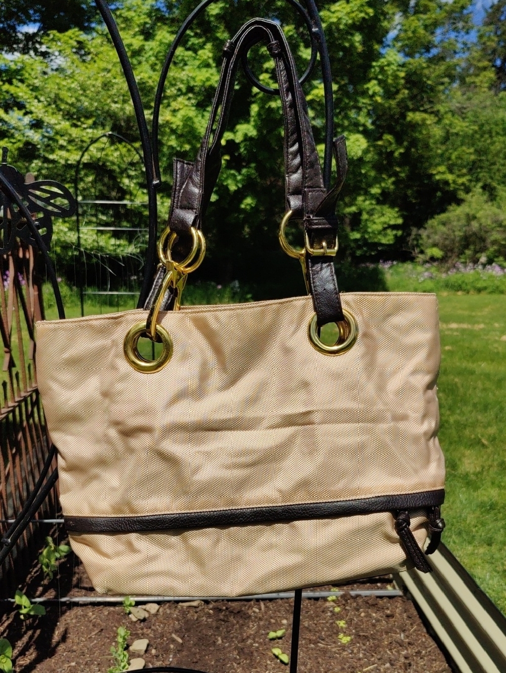 Beige Tote with Dark Brown Trim and Gold Ring Details